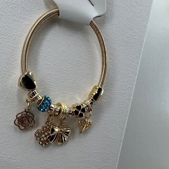 Gold tone Charm stretchy Bracelet with Blue Accents - Picture 5 of 5